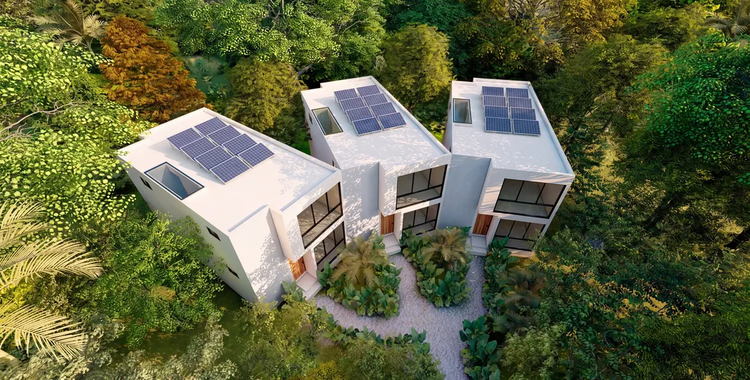 Exterior of the type C villa, with solar panels on the roofs